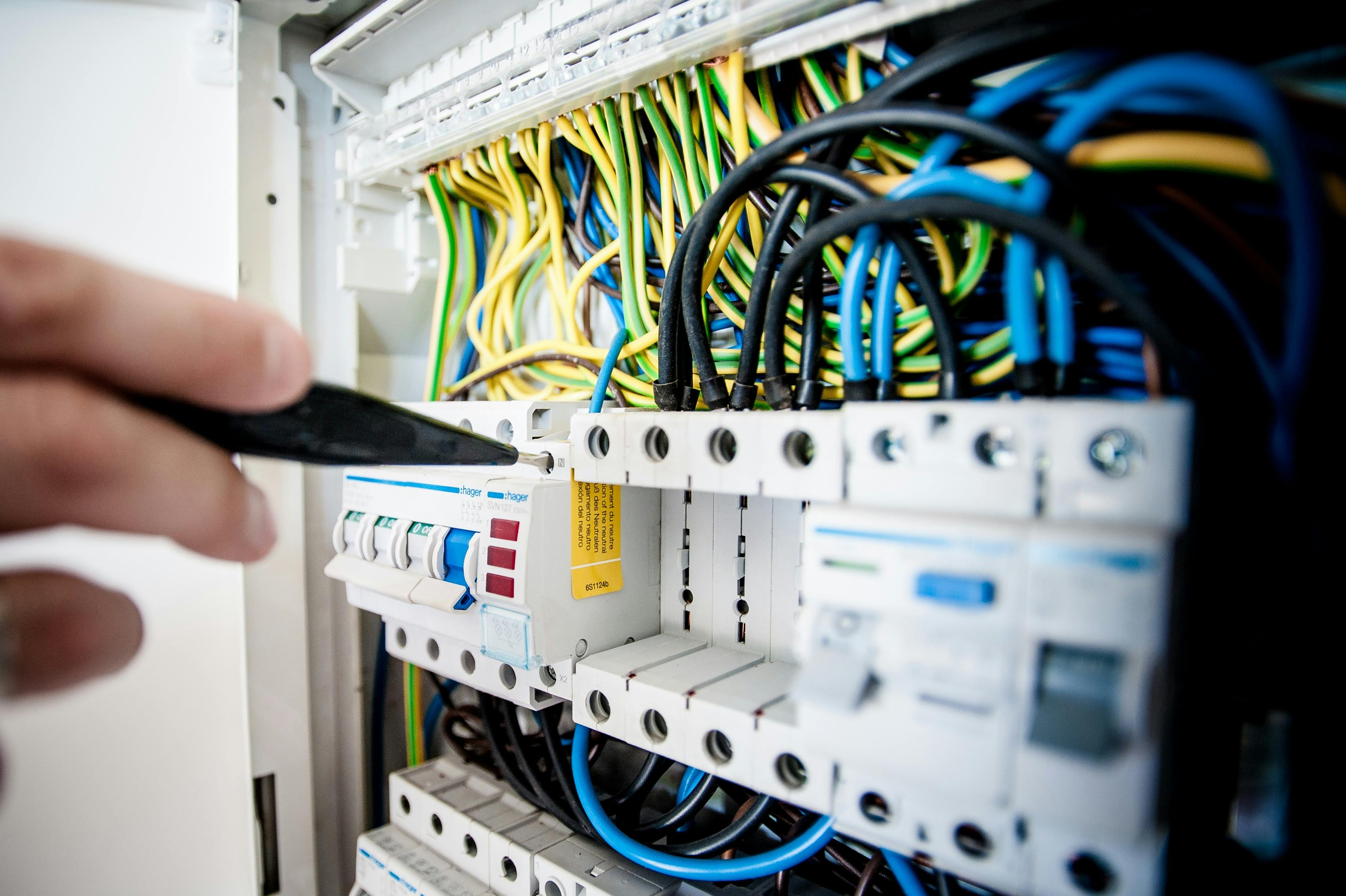 Electrician working on a panel