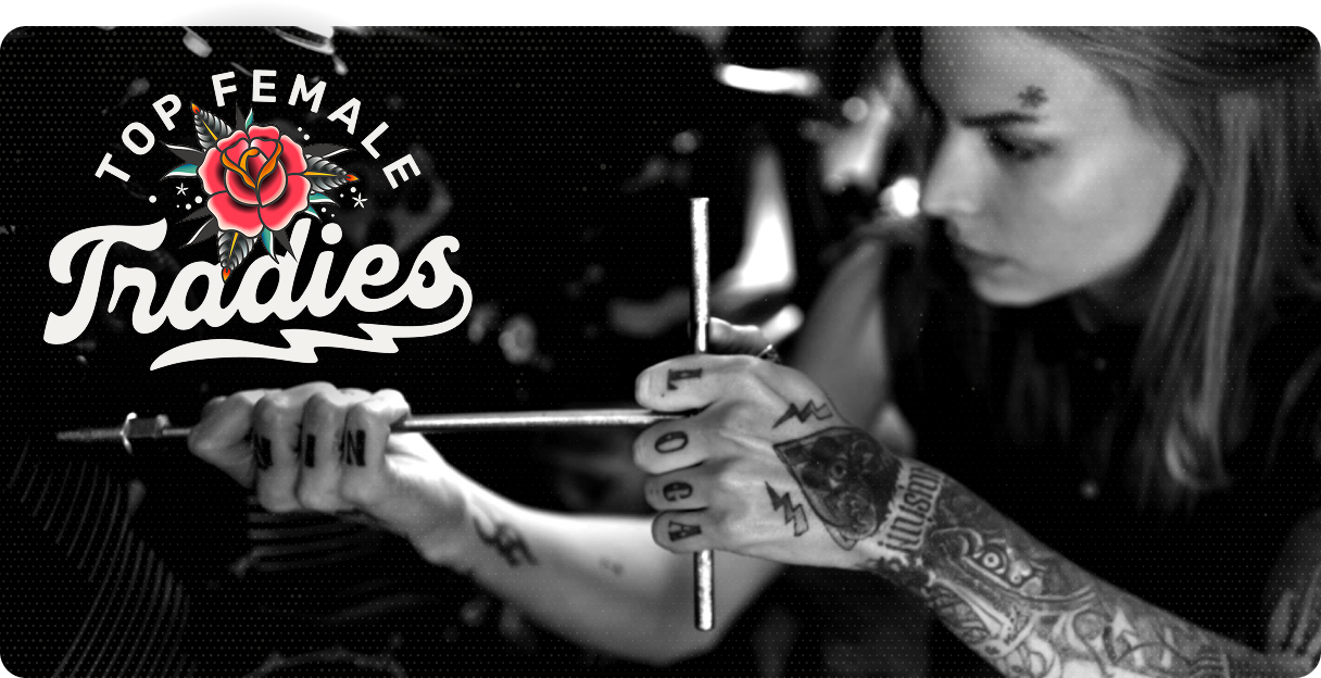 Female welder in workshop